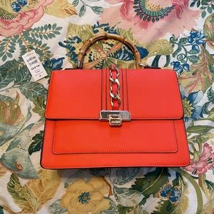 Aldo Raebeth, coral orange